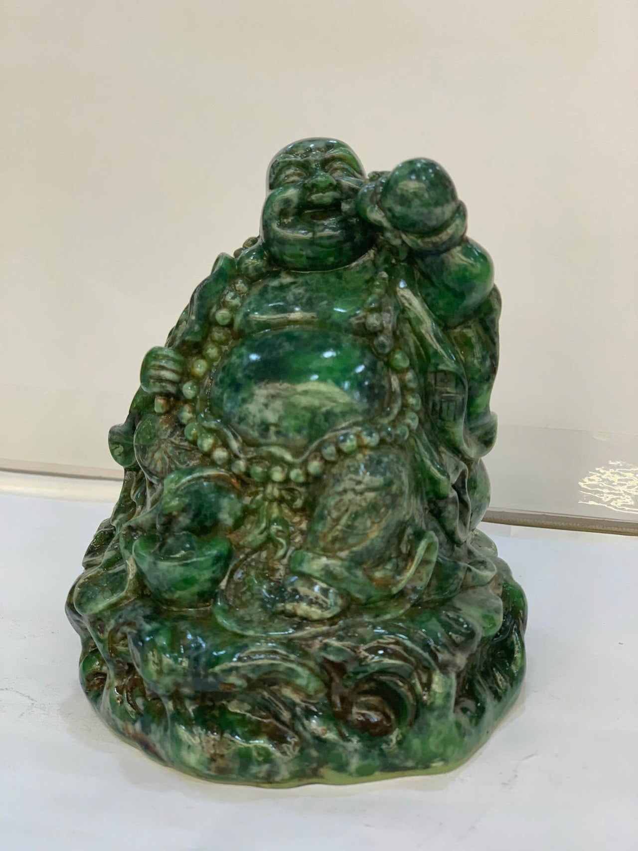 SITTING HAPPY BUDDHA LANDSCAPE JADE STATUE, JOYFUL AND CHEERFUL, HOLDING A GOURD AND A FAN, HAND-CARVED BY ARTISANS, GIFT FOR HIM, GIFT FOR FATHER, OFFICE DECOR, HANDMADE SCULPTURE.