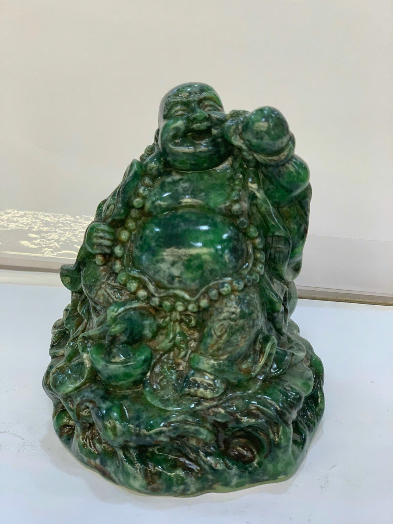 SITTING HAPPY BUDDHA LANDSCAPE JADE STATUE, JOYFUL AND CHEERFUL, HOLDING A GOURD AND A FAN, HAND-CARVED BY ARTISANS, GIFT FOR HIM, GIFT FOR FATHER, OFFICE DECOR, HANDMADE SCULPTURE.