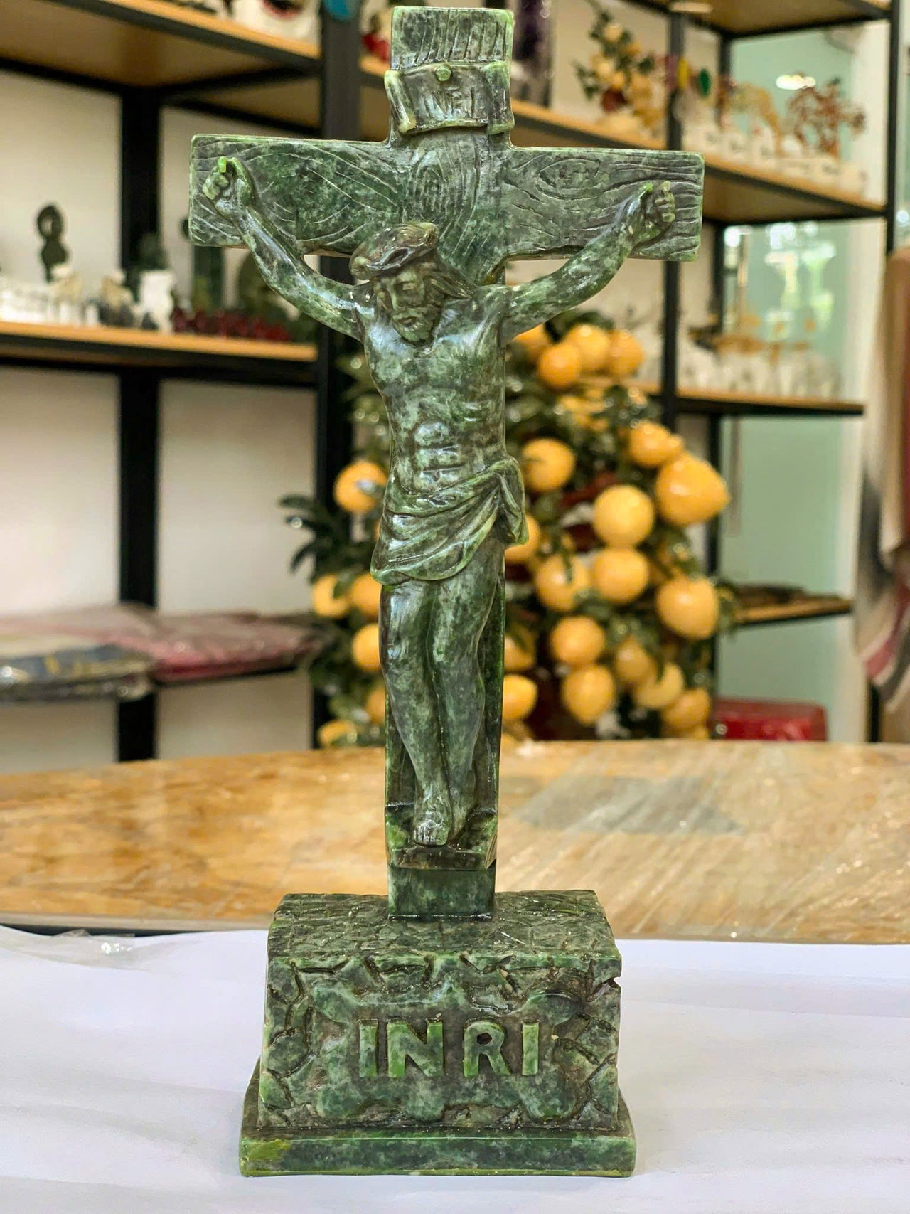 A GREEN JADE SCULPTURE DEPICTING JESUS CHRIST ON THE CROSS, THE ULTIMATE SACRIFICE OF JESUS, JESUS- THE SAVIOR, THE RESURRECTION, THE CROSS AND HOPE, DECORATING WITH RELIGIOUS STATUES