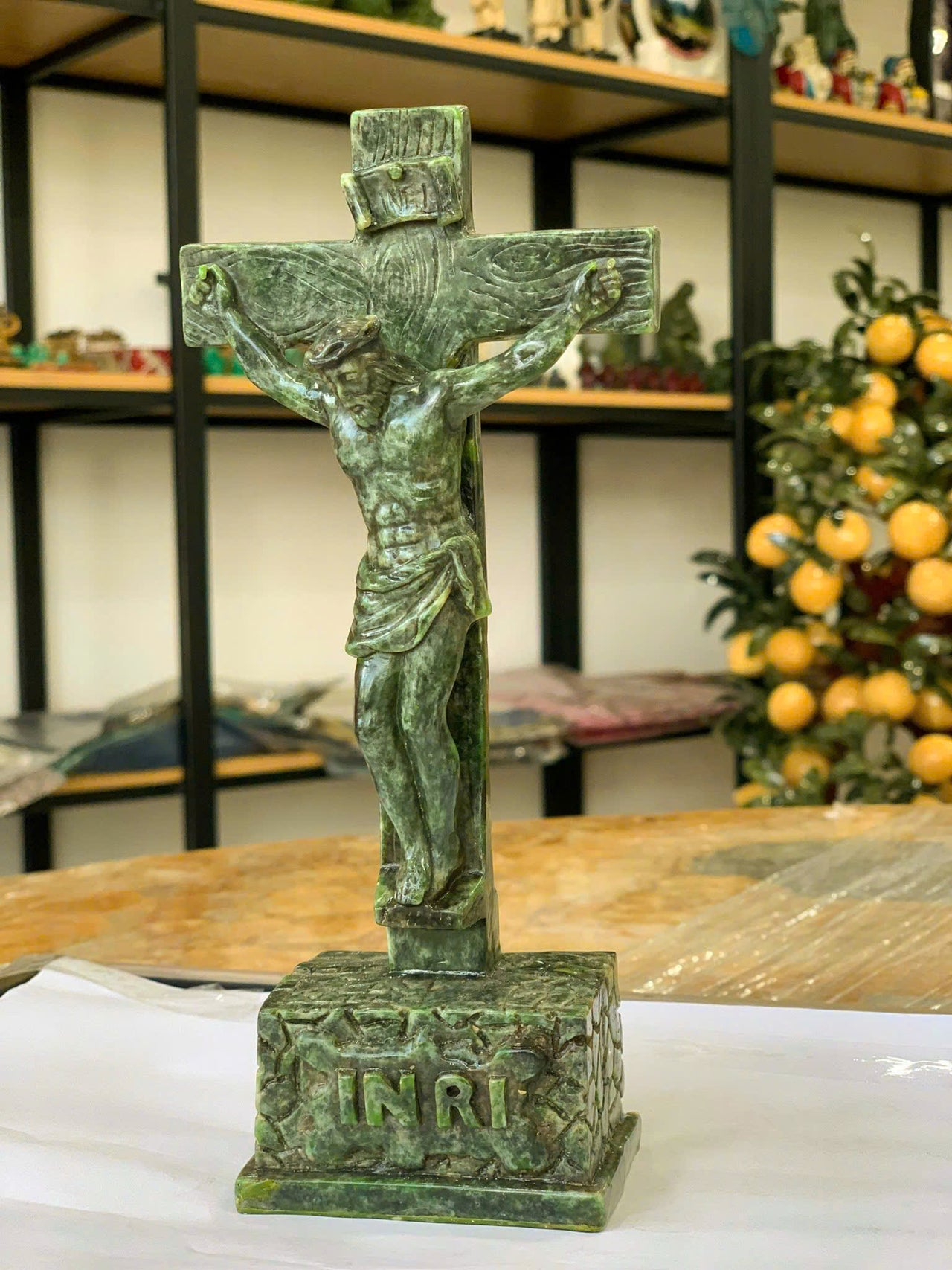 A GREEN JADE SCULPTURE DEPICTING JESUS CHRIST ON THE CROSS, THE ULTIMATE SACRIFICE OF JESUS, JESUS- THE SAVIOR, THE RESURRECTION, THE CROSS AND HOPE, DECORATING WITH RELIGIOUS STATUES