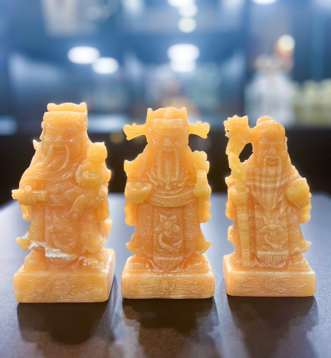 A METICULOUSLY HAND CARVED NATURAL JADE STATUE OF THE THREE DEITIES OF HAPPINESS-WEALTH-LONGEVITY. DIMENSIONS: L2.7in-W1.5in-H1.9in.